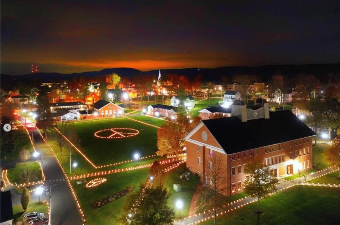 nightime aerial shot of Cheshire Academy lit up