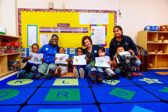 CHildren's Aid teachers posing with children