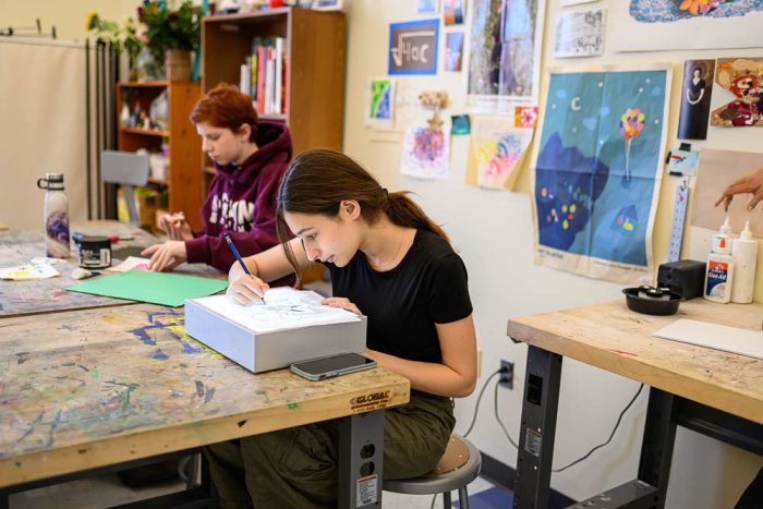two gann academy students working on an art project