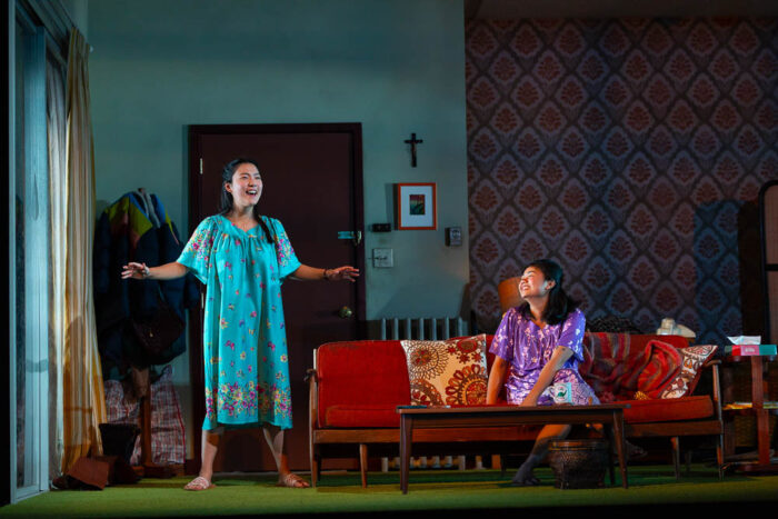 The Huntington two actresses on stage in costume performing