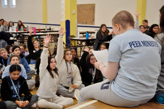 Ursuline School teacher working with students